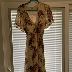 Vintage inspired faux wrap dress with floral pattern